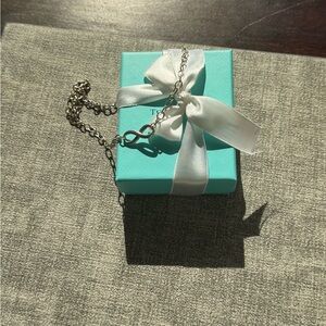 Tiffany & Co. Silver Infinity Pendant with Blue Box